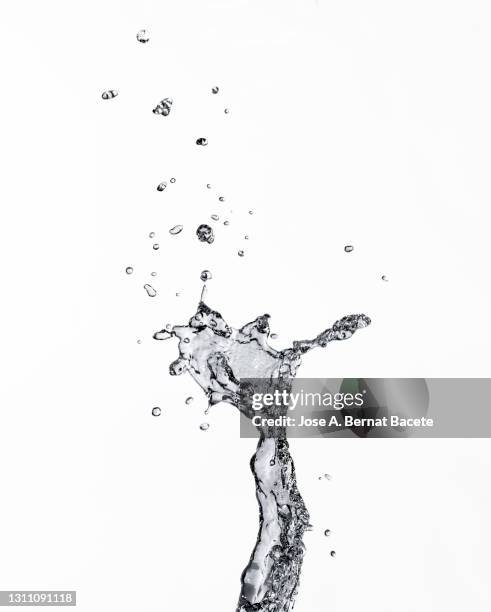 jet of water with splashes and drops on a white background. - tropfen aufprall stock-fotos und bilder