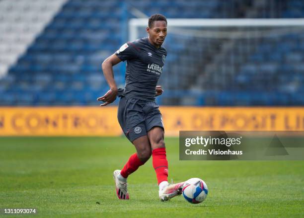 Ethan Pinnock of Brentford in action during the Sky Bet Championship match between Huddersfield Town and Brentford at John Smith's Stadium on April...