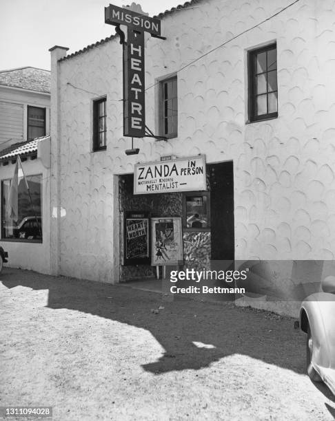 The Mission Theatre, advertising a performance by nationally known mentalist Zanda, in Solvang, California, 9th April 1939. The Mission Theatre is...