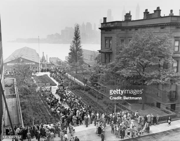 High angle view of the opening ceremony of Brooklyn Heights promenade along the East River, New York City, New York, 7th October 1950. Visible but...