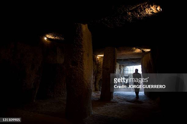 Man walks around the Dolmens in Antequera, southern Spain, on November 1, 2011. Antequera's Dolmens have been included on Spain's Tentative List for...