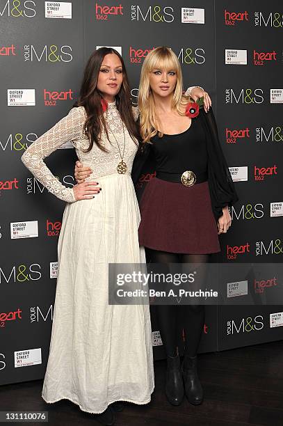 Catherine Pierce and Alison Pierce of "The Pierces" attend the switch on of the Oxford Street Christmas Lights on November 1, 2011 in London, England.