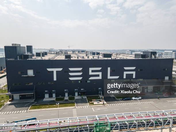 An aerial view of Tesla Shanghai Gigafactory on March 29, 2021 in Shanghai, China. Tesla Shanghai Gigafactory is reportedly producing vehicles at a...