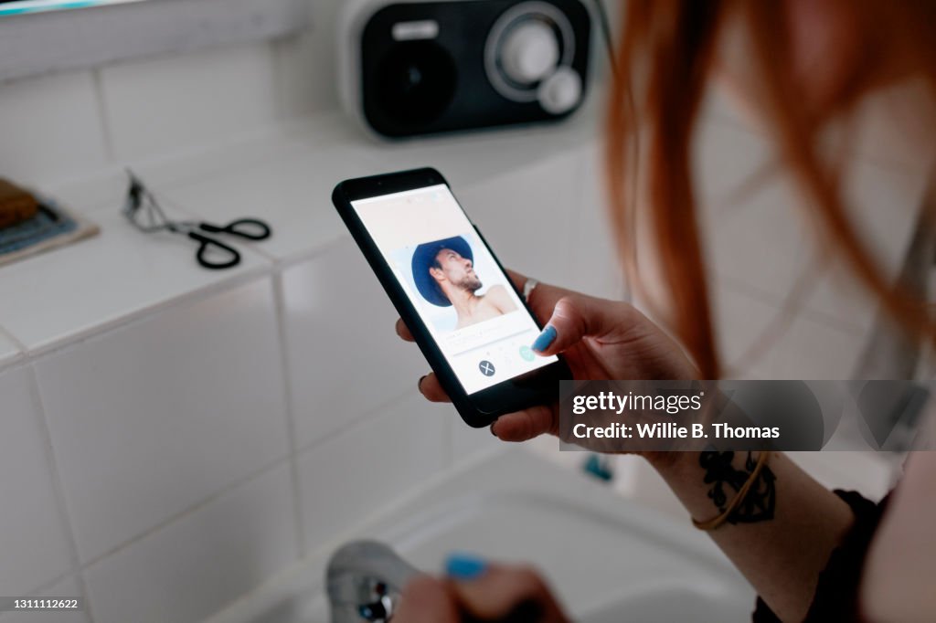 Woman Using Dating App To Message A Man