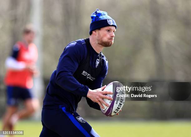 Rory Hutchinson runs with the ball during the Northampton Saints training session held at Franklin's Gardens on April 06, 2021 in Northampton,...