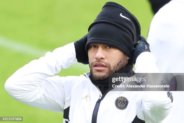 Neymar of Paris loosk on during a PSG Paris Saint-Germain training session ahead of the UEFA Champions League Quarter Final match against FC Bayern...