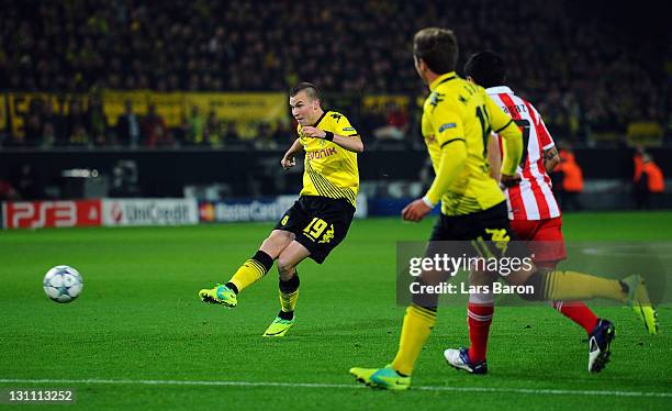 Kevin Grosskreutz of Dortmund scores his teams first goal during the UEFA Champions League group F match between Borussia Dortmund and Olympiacos FC...