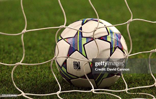 Champions League football is seen in a goal during the UEFA Champions League Group F match between Arsenal FC v Olympique de Marseille at Emirates...