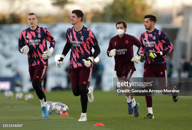 Andriy Lunin, Thibaut Courtois and Diego Altube of Real Madrid enter the pitch for their warm up prior to the UEFA Champions League Quarter Final...