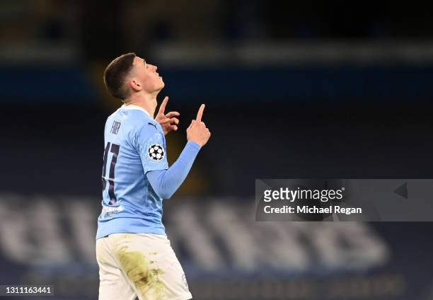 Phil Foden of Manchester City celebrates after scoring their team's second goal during the UEFA Champions League Quarter Final match between...
