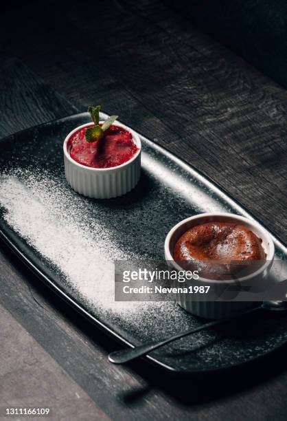chocolate soufflé and ice-cream - souffle stock pictures, royalty-free photos & images