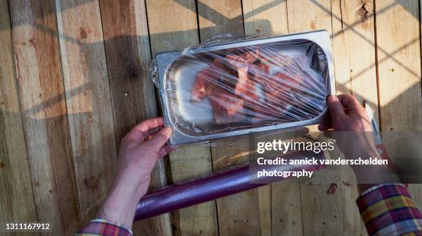 Plastic Wrap Roll Photos and Premium High Res Pictures - Getty Images