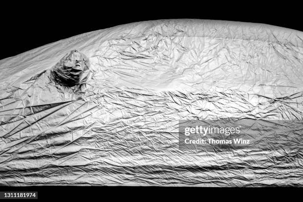 covered vehicle - covered car stock-fotos und bilder