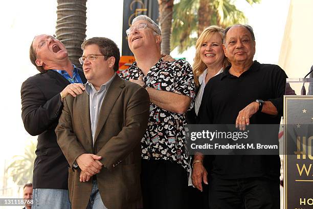 Director John Lasseter, actor Patton Oswalt, composer Randy Newman, actress Bonnie Hunt and actor Cheech Marin pose for photographers during the...