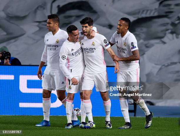 Marco Asensio of Real Madrid celebrates with team mates after scoring their team's second goal during the UEFA Champions League Quarter Final match...