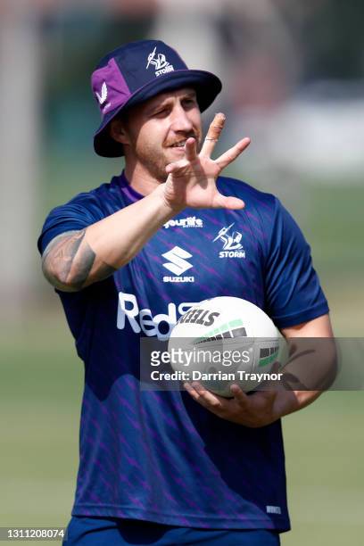 Cameron Munster of the Storm gestures during a Melbourne Storm NRL training session at Gosch's Paddock on April 07, 2021 in Melbourne, Australia.