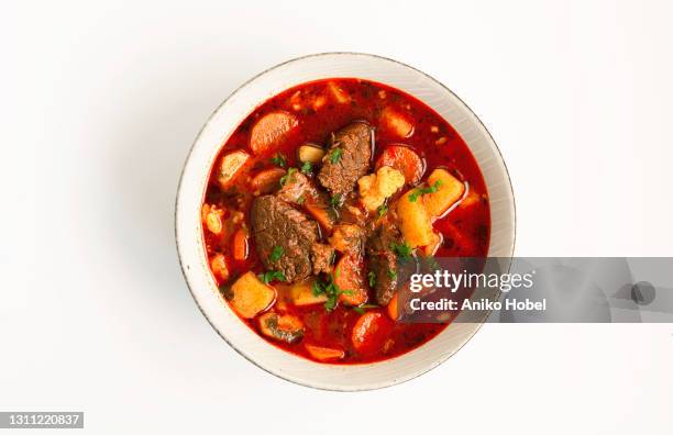 goulash soup - hungarian culture stock-fotos und bilder