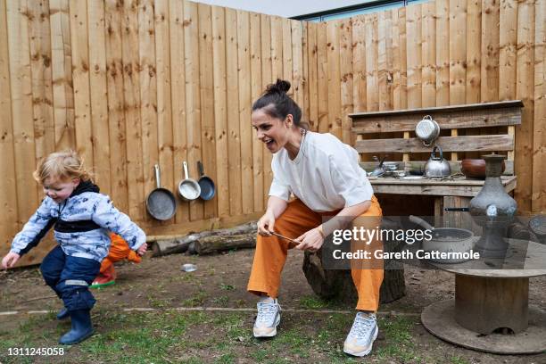 In this image released on the April 9th, Charlotte Riley, actress and co-founder of the Wonderworks plays with children at Warner Bros Studios on...