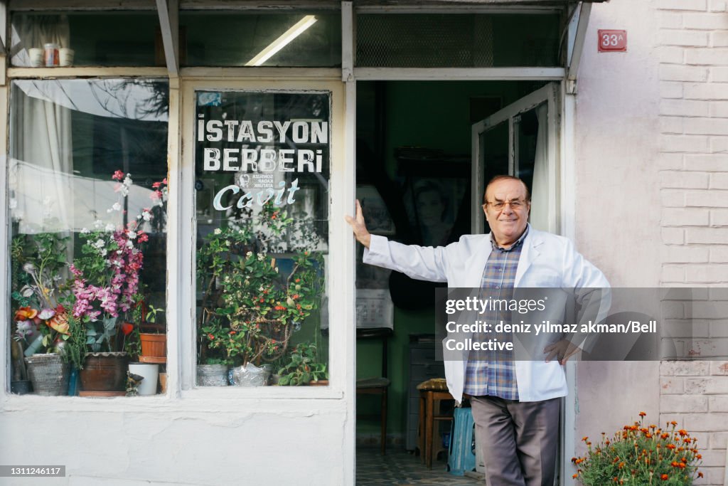 A barbershop owner in an old neighborhood of Istanbul