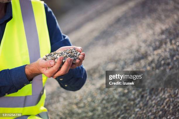 gravel quality control - gravel pile stock pictures, royalty-free photos & images