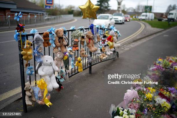 Flowers and tributes lay at the scene where baby Ciaran Lee Morris was killed in Brownhills High Street. April 07, 2021 in Walsall, England. A...