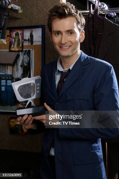 Doctor Who actor David Tennant photographed holding a TV Times award in the costume department, on November 23, 2006.