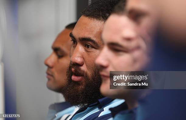 Charlie Faumuina of the Blues is seen with team mates Rudi Wulf and Alby Mathewson during the 2012 Auckland Blues Super Rugby squad announcement at...