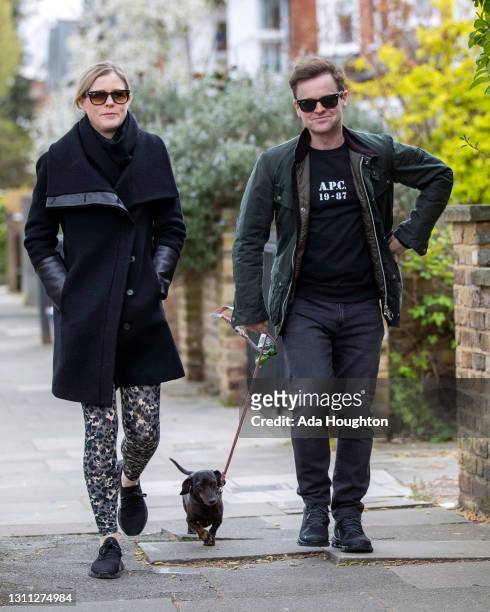 Declan Donnelly and Ali Astall seen taking their dog for a walk after it was reported that burglars attempted but failed to force open iron gates at...