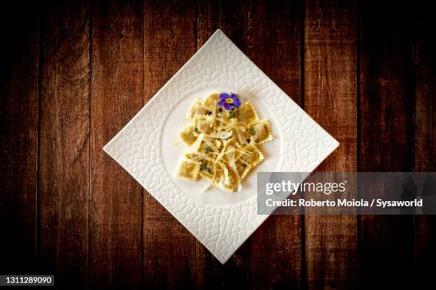 dish of ravioli with game meat from above, italy - rabbit game meat stock pictures, royalty-free photos & images