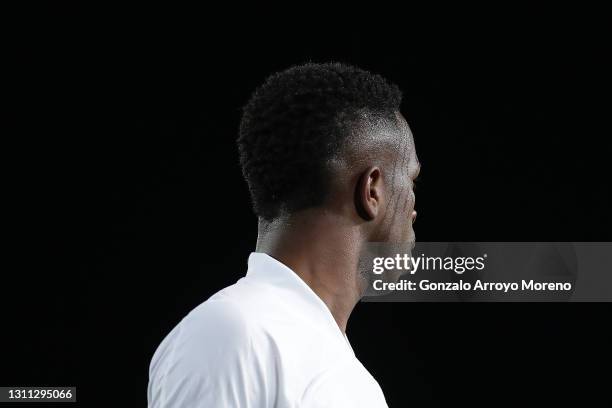 Vinicius Junior of Real Madrid CF reacts during the UEFA Champions League Quarter Final match between Real Madrid and Liverpool FC at Estadio Alfredo...