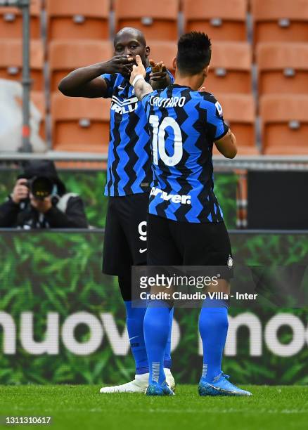 Romelu Lukaku of FC Internazionale celebrates with Lautaro Martinez after scoring the opening goal during the Serie A match between FC Internazionale...