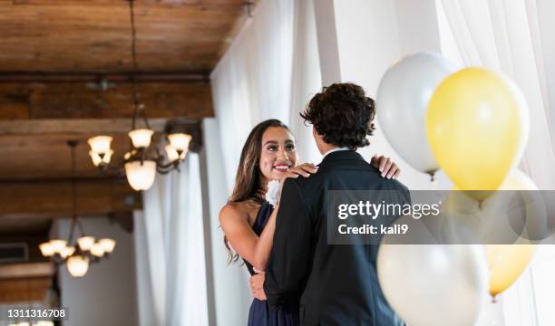 teenage couple dressed for prom, slow dancing - prom dancing stock pictures, royalty-free photos & images