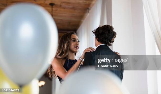 teenage couple dressed for prom, slow dancing - slow dancing stock pictures, royalty-free photos & images
