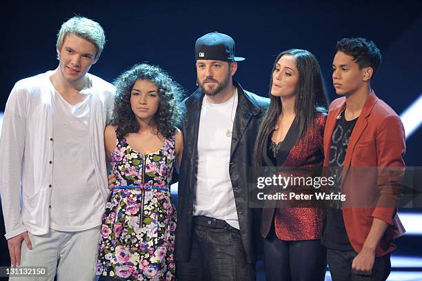 Martin Madeja, Monique Simon, mentor Mirko Bogojevic, Raffaela Wais and Kassim Auale wait for the results of the televoting during 'The X Factor...