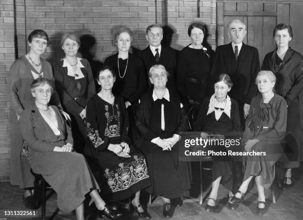 Portrait of staff members and residents of the Hull House settlement, Chicago, Illinois, circa 1930. Pictured are, back row from left, Juvenile...