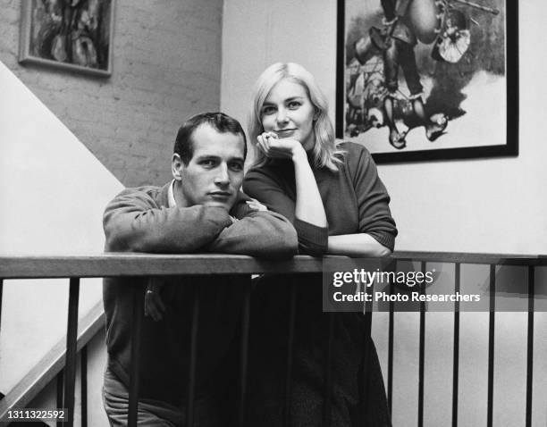 Portrait of married American actors Paul Newman and Joanne Woodward at home in their Greenwich Village apartment, New York, New York, circa 1961.