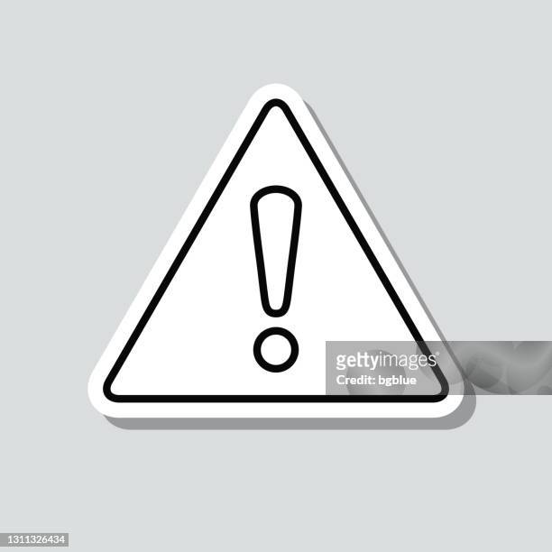 hazard warning attention. icon sticker on gray background - exclamation mark stock illustrations