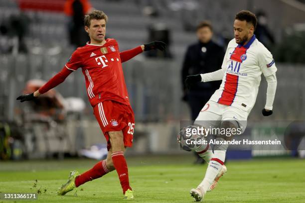 Thomas Muller of FC Bayern Munich is closed down by Neymar of Paris Saint-Germain during the UEFA Champions League Quarter Final match between FC...