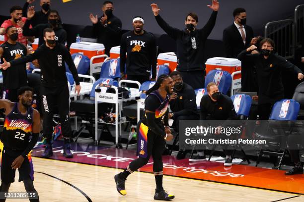 Jae Crowder of the Phoenix Suns reacts after hitting a three-point shot against the Utah Jazz during the second half of the NBA game at Phoenix Suns...