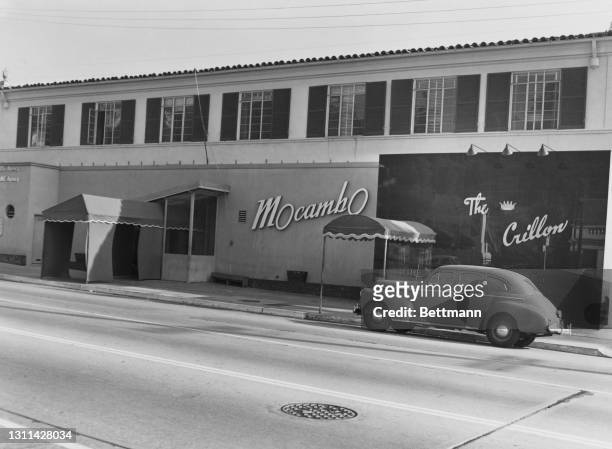 The exterior of the 'Mocambo', a nightclub on Sunset Strip, a stretch of Sunset Boulevard, and the separate 'The Crillon' restaurant, in West...