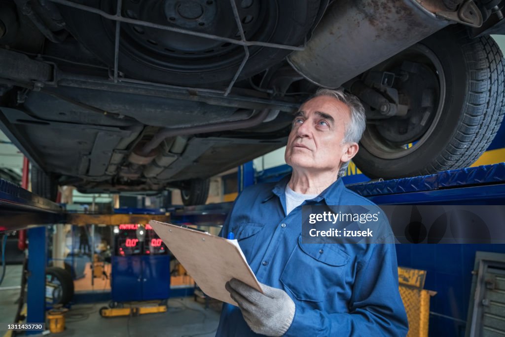 Check Example Mechanic Car Mechanic Checking Vehicle Chassis High-Res Stock Photo - Getty Images