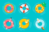 Rubber or inflatable ring vector set isolated from the background. Colorful icons swim ring in a flat style. Symbols vacation or holiday
