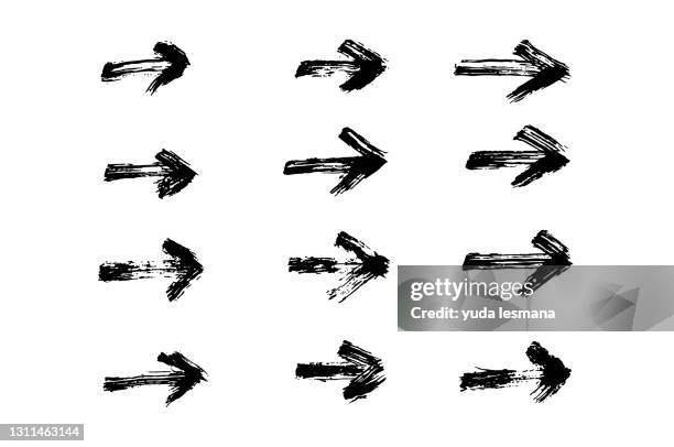 grunge texture arrow - spray paint circle vector stock illustrations