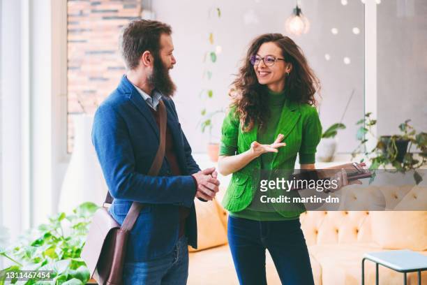 happy employees at work - interview event stock pictures, royalty-free photos & images