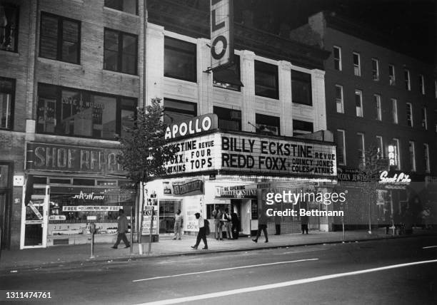 The marquee advertises performances by the Billy Eckstine Revue, Quincy Jones, the dance act Coles & Atkins, and the Four Tops at the Apollo Theater...