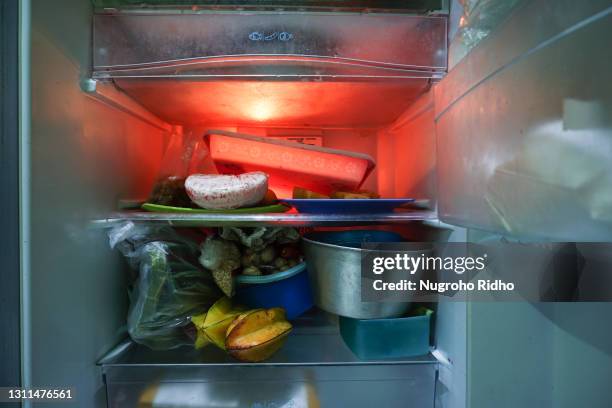 messy refrigerator cabinet - ice shelf stock pictures, royalty-free photos & images