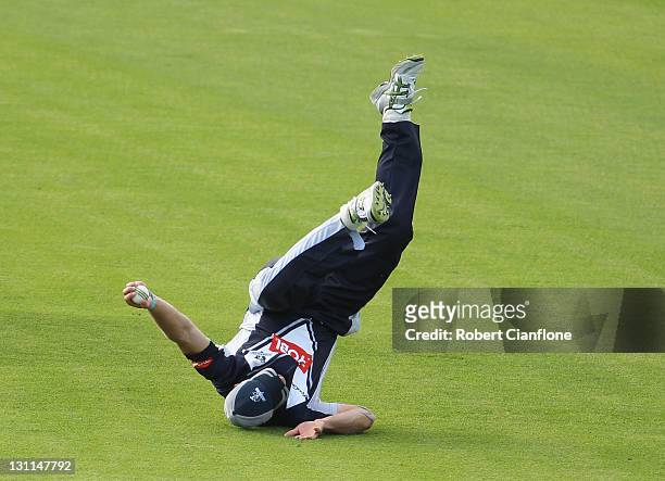 Jayde Herrick of the Bushrangers takes a catch to dismiss Nick Kruger of the Tigers during the Ryobi One Day Cup match between the Tasmania Tigers...