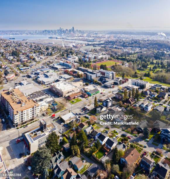 west seattle neighborhood view towards seattle - seattle aerial stock pictures, royalty-free photos & images