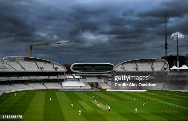 General view of play over stormy skys during Day One of the LV= Insurance County Championship match between Middlesex and Somerset at Lord's Cricket...