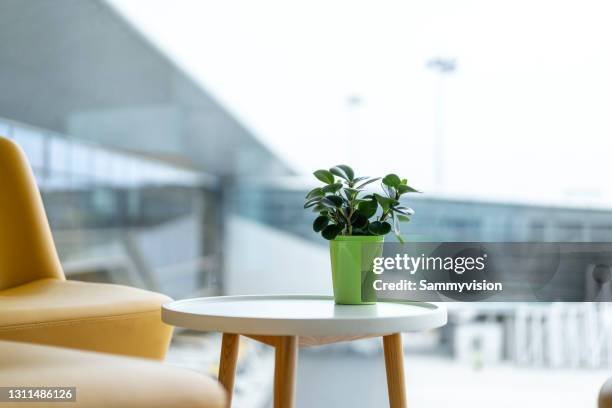 relax area in airport terminal - side table stock pictures, royalty-free photos & images